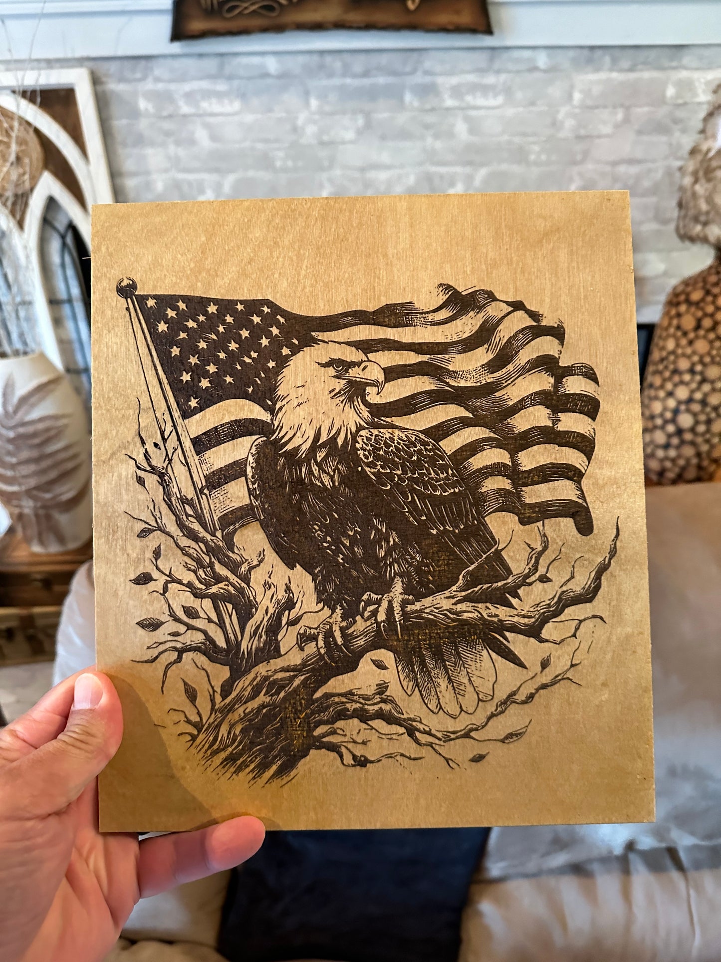 Wood engraved eagle and flag.