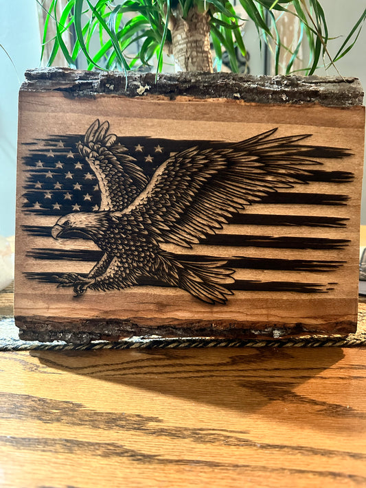 American flag with eagle engraving.