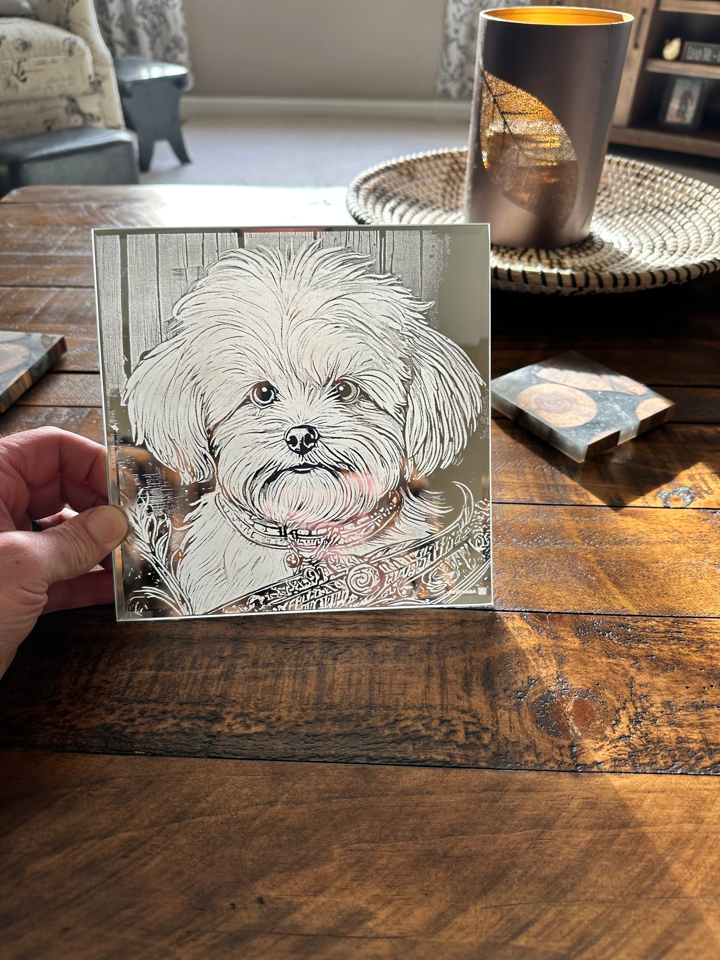 Maltese puppy engraved on mirror.